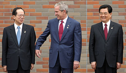 Bush at the G8 Summit in Toyako.  As he left, he said "Goodbye from the world's biggest polluter" and then "punched the air while grinning widely."  Seriously.